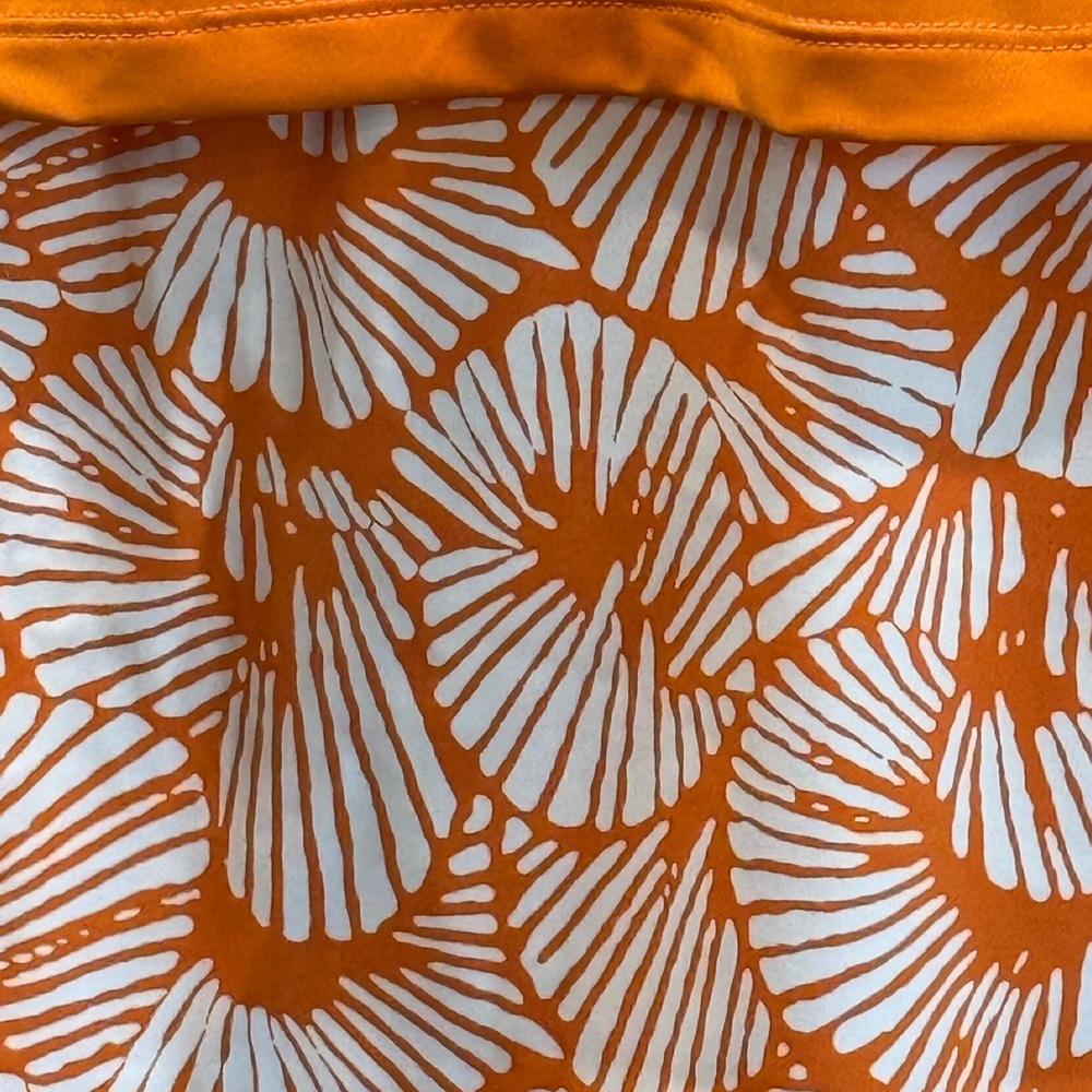 Women’s Tommy Bahama Golf Orange Polo and Skort Outfit - Picture 4 of 5